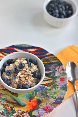 Mixed with almond milk, Greek yogurt, fresh berries and honey Blueberry Overnight Oats are a deliciously easy breakfast solution! TheCornerKitchenBlog.com