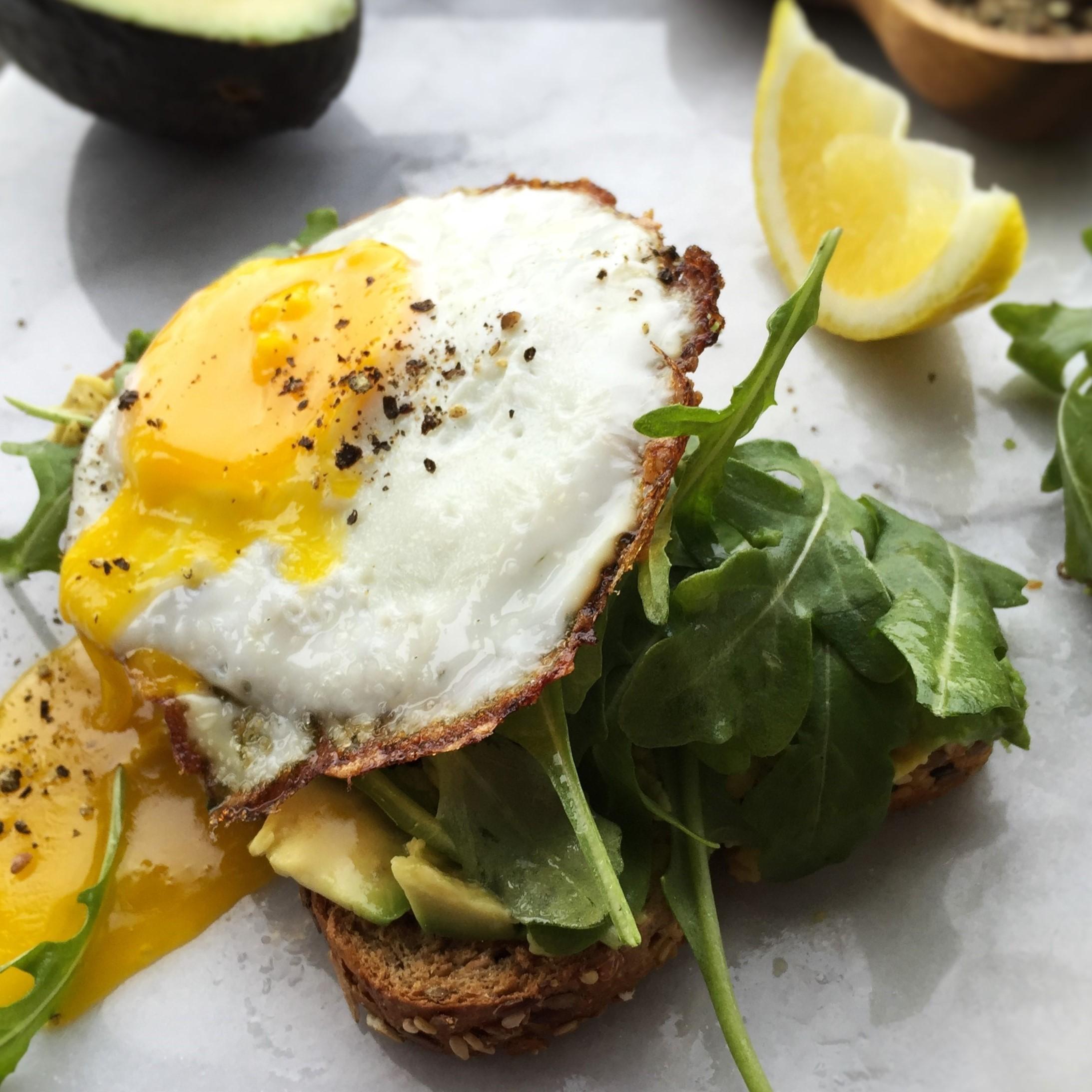 avocado toast with lemony arugula salad and egg - Jackie Newgent