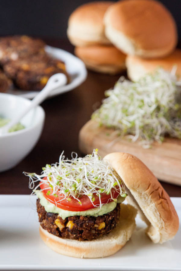 Meet the veggie burger of your dreams....Chipotle Black Bean Freekeh Sliders with Avocado Lime Crema! | TheCornerKitchenBlog.com #BurgerWeek #freekeh #veggieburger